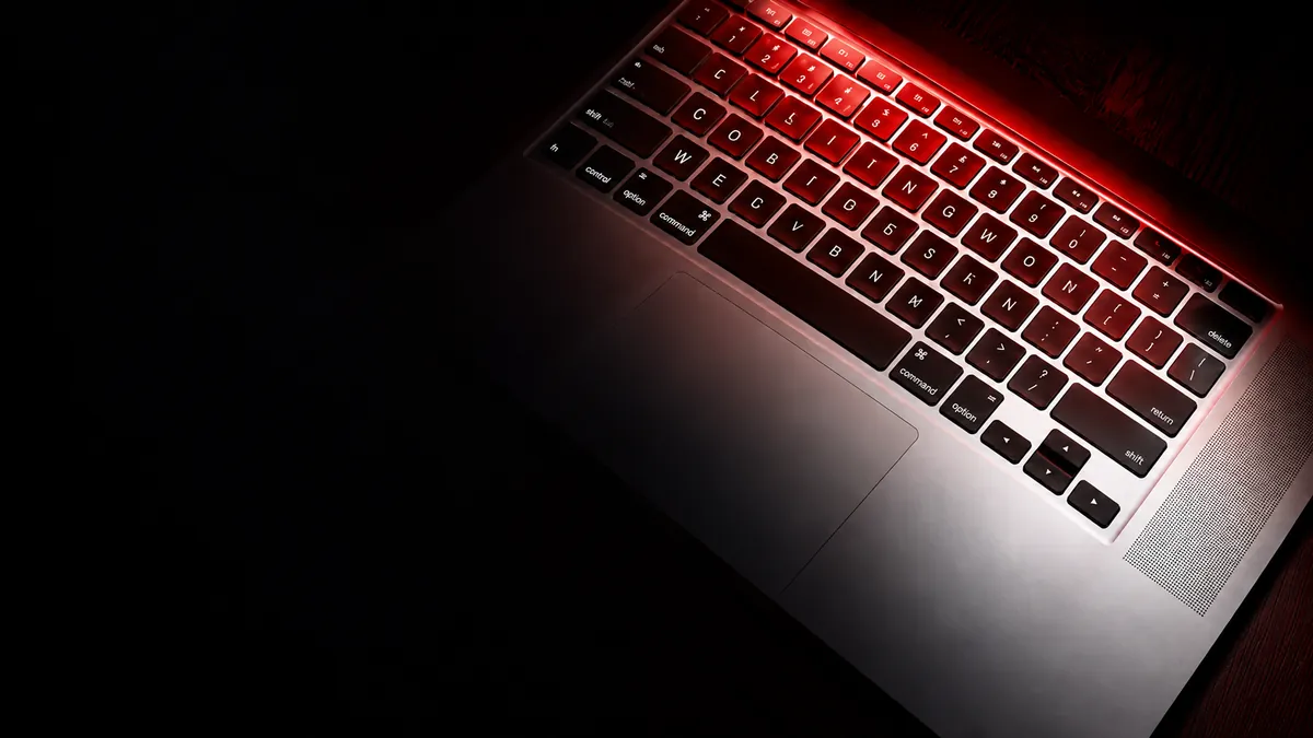 Laptop keyboard with red backlighting