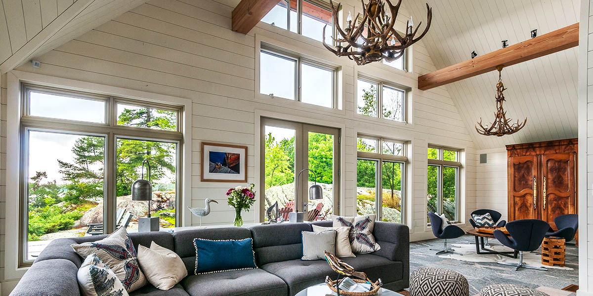 Sunlit living room with large windows