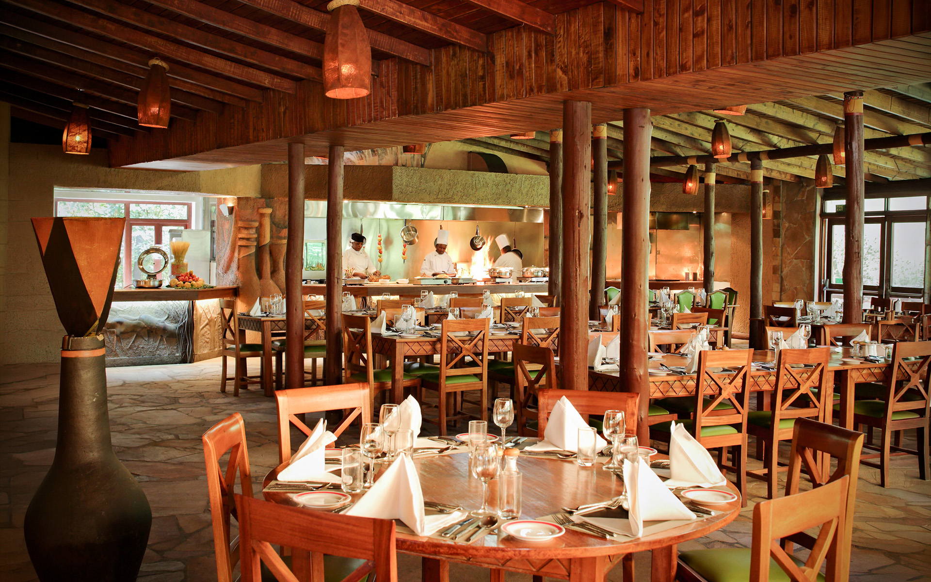Dining or lounge area at Sarova Mara Game Camp overlooking the bush