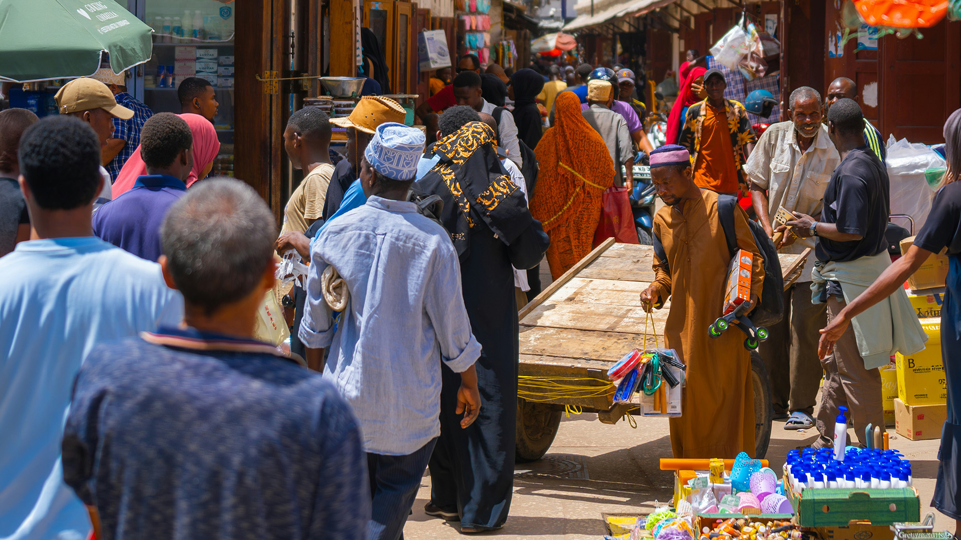 Busy outdoor market street in Stone Town, Zanzibar