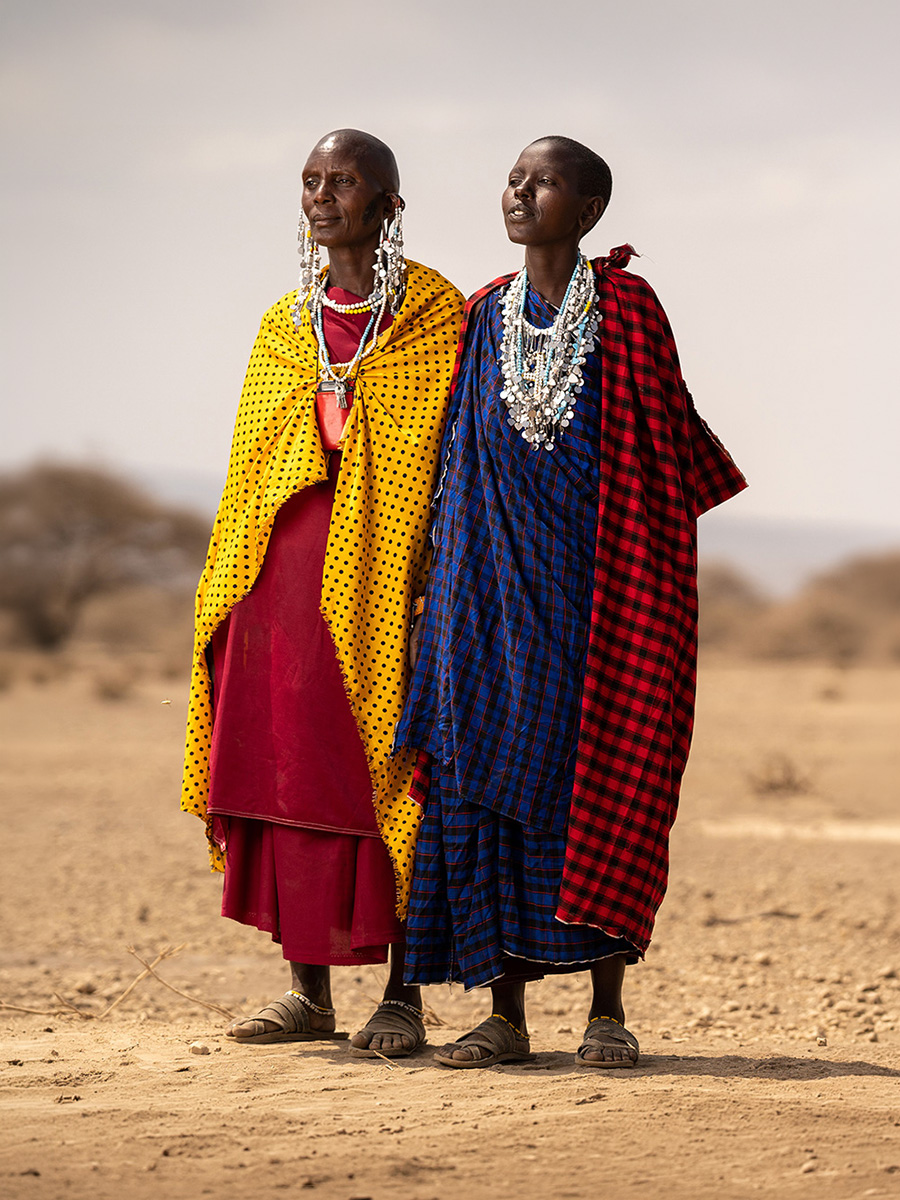 Maasai guides in traditional dress on the savanna